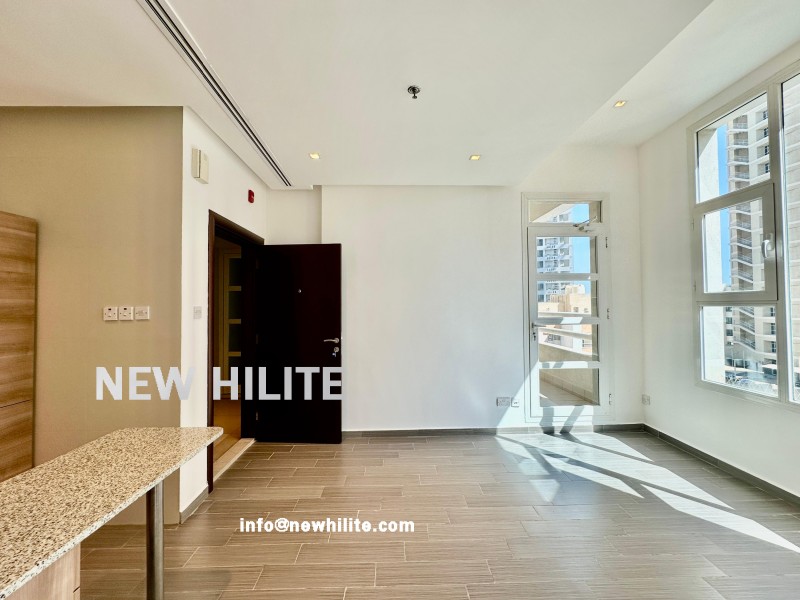 1BR APT SALMIYA 400 Modern One-Bedroom Apartment with Balcony for Rent in Salmiya